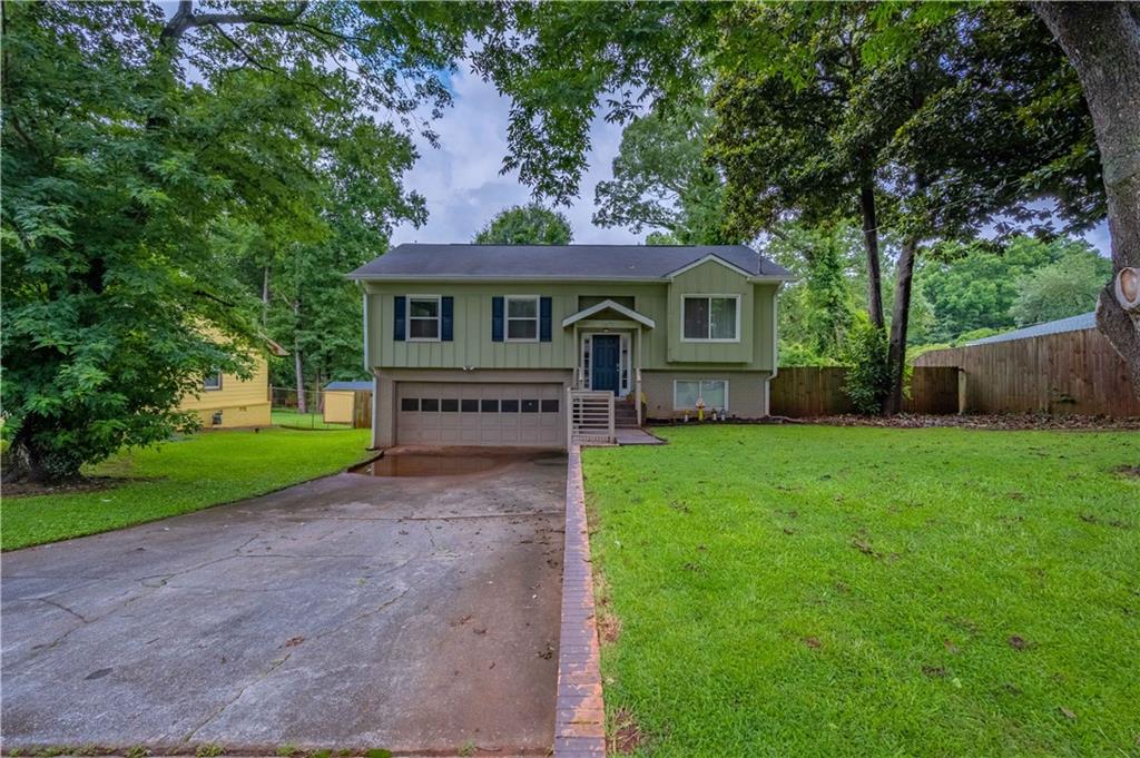 1477 Peachcrest Court Decatur, GA 30032 - Photo 1 of 1 a view of house with a yard