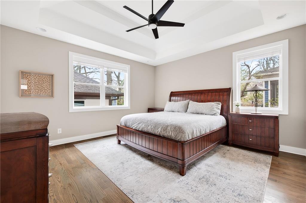209 Ridgeland Avenue Decatur, GA 30030 - Photo 13 of 23 a spacious bedroom with a bed and window