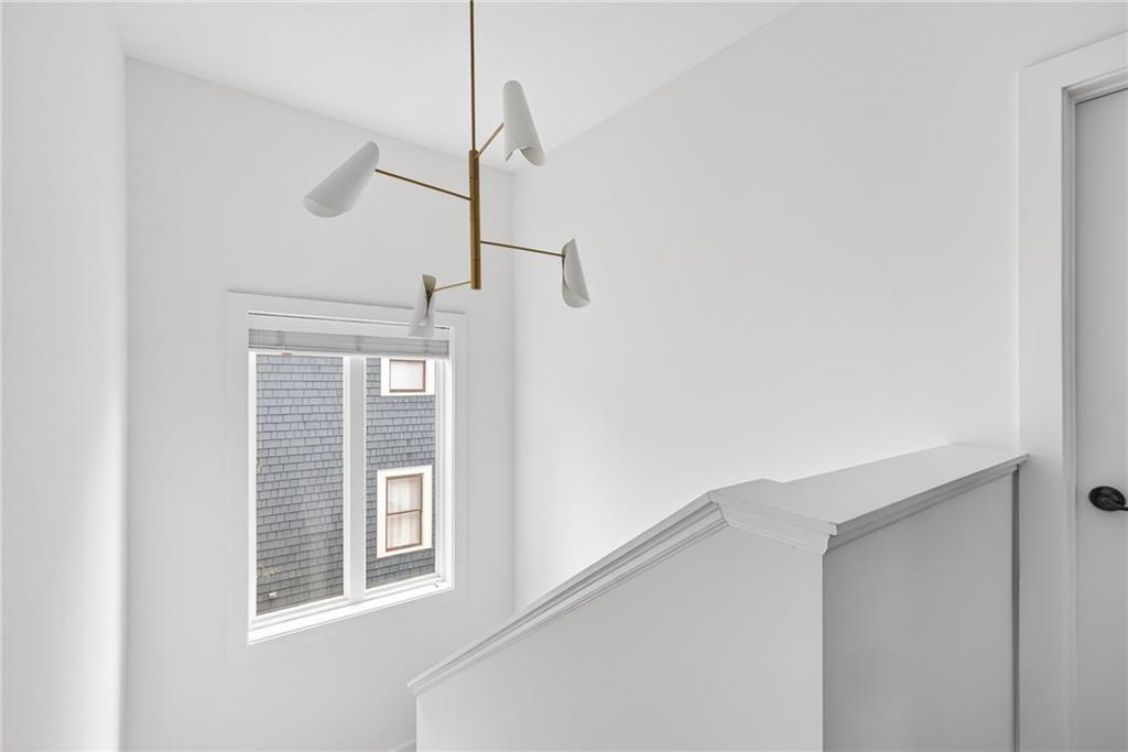 209 Ridgeland Avenue Decatur, GA 30030 - Photo 16 of 23 a view of empty room with windows