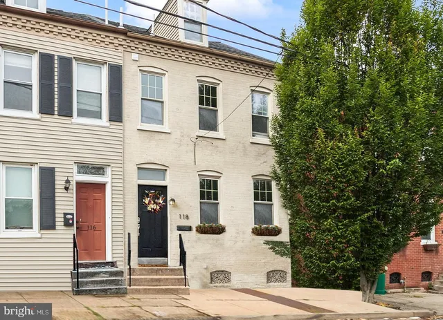 a view of a building with a street