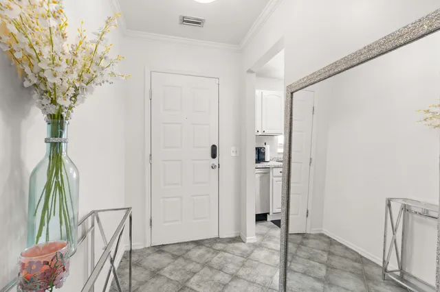 a view of entryway with wooden floor