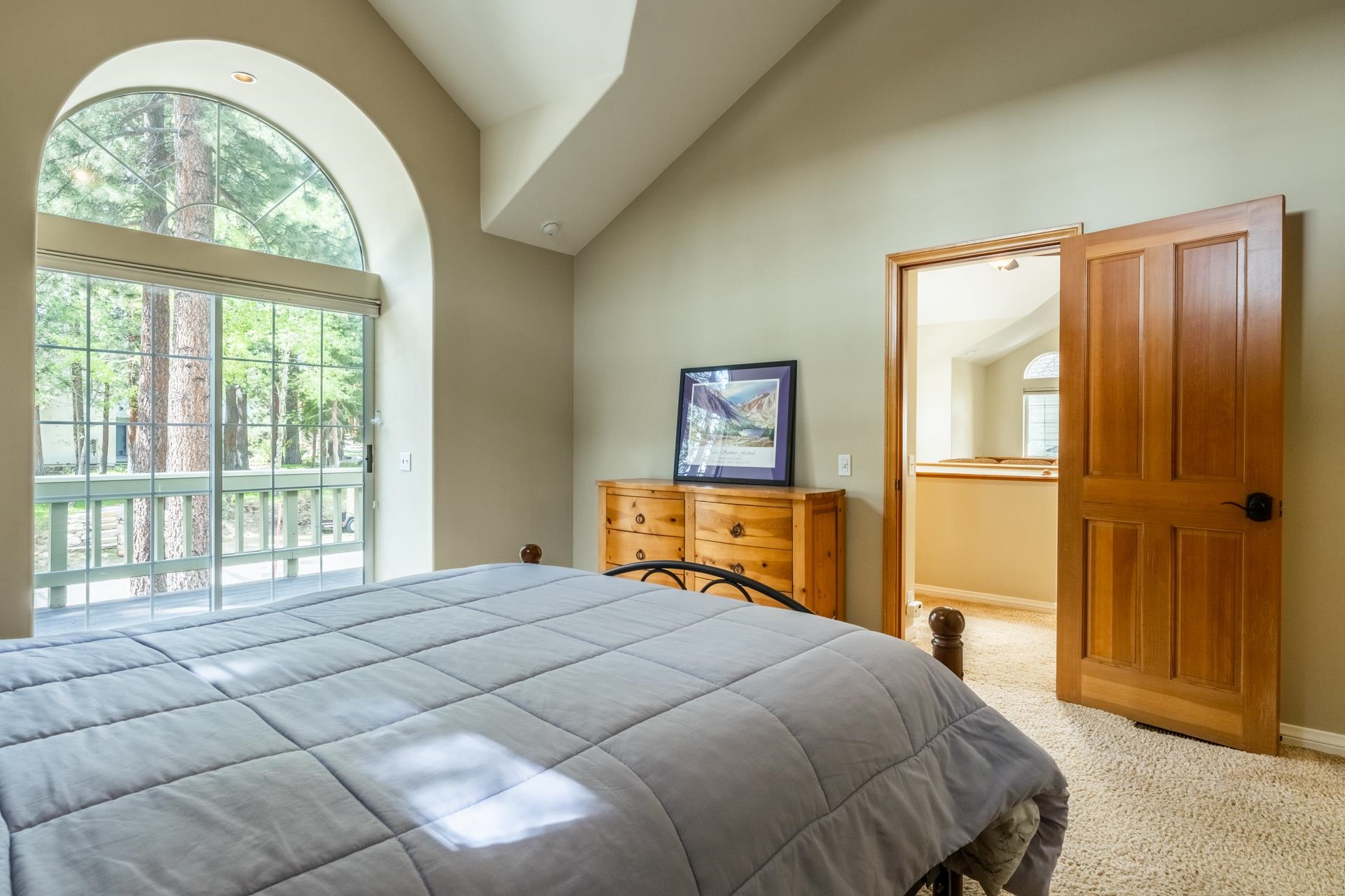 272 Ridge Way Mammoth Lakes, CA 93546 - Photo 32 of 55 Arched window with sliding glass door and balcony access