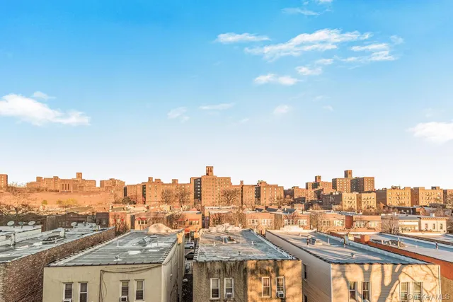 a view of a city with tall buildings