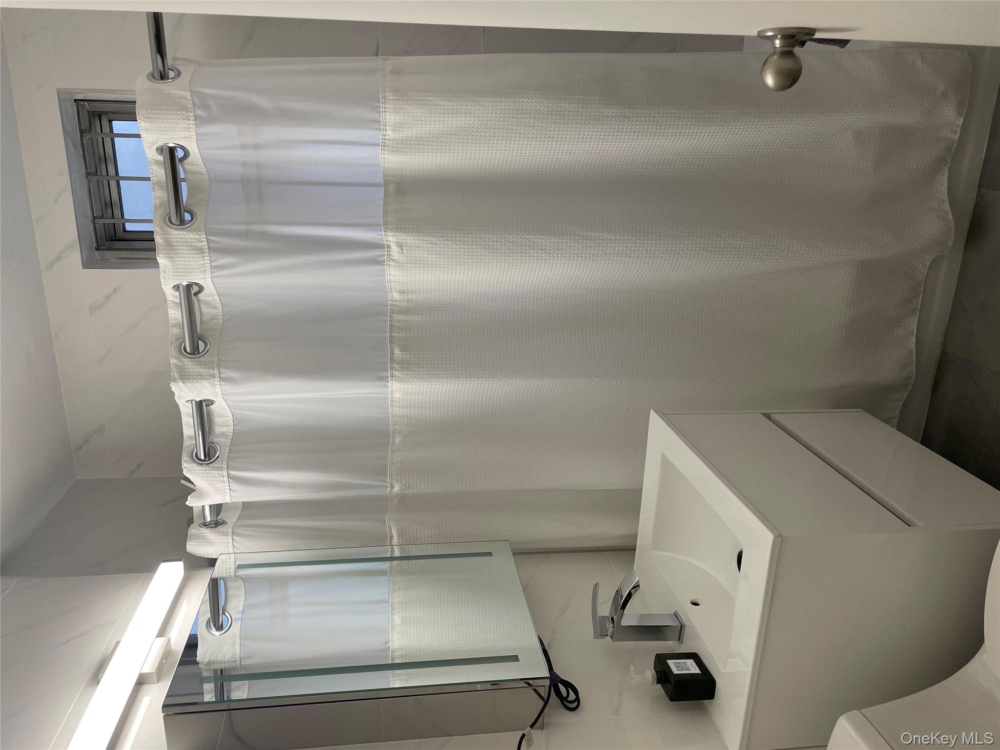 1430 Thieriot Avenue, Unit 6J Bronx, NY 10460 - Photo 7 of 15 Fully upgraded Bathroom with new toilet and new vanity