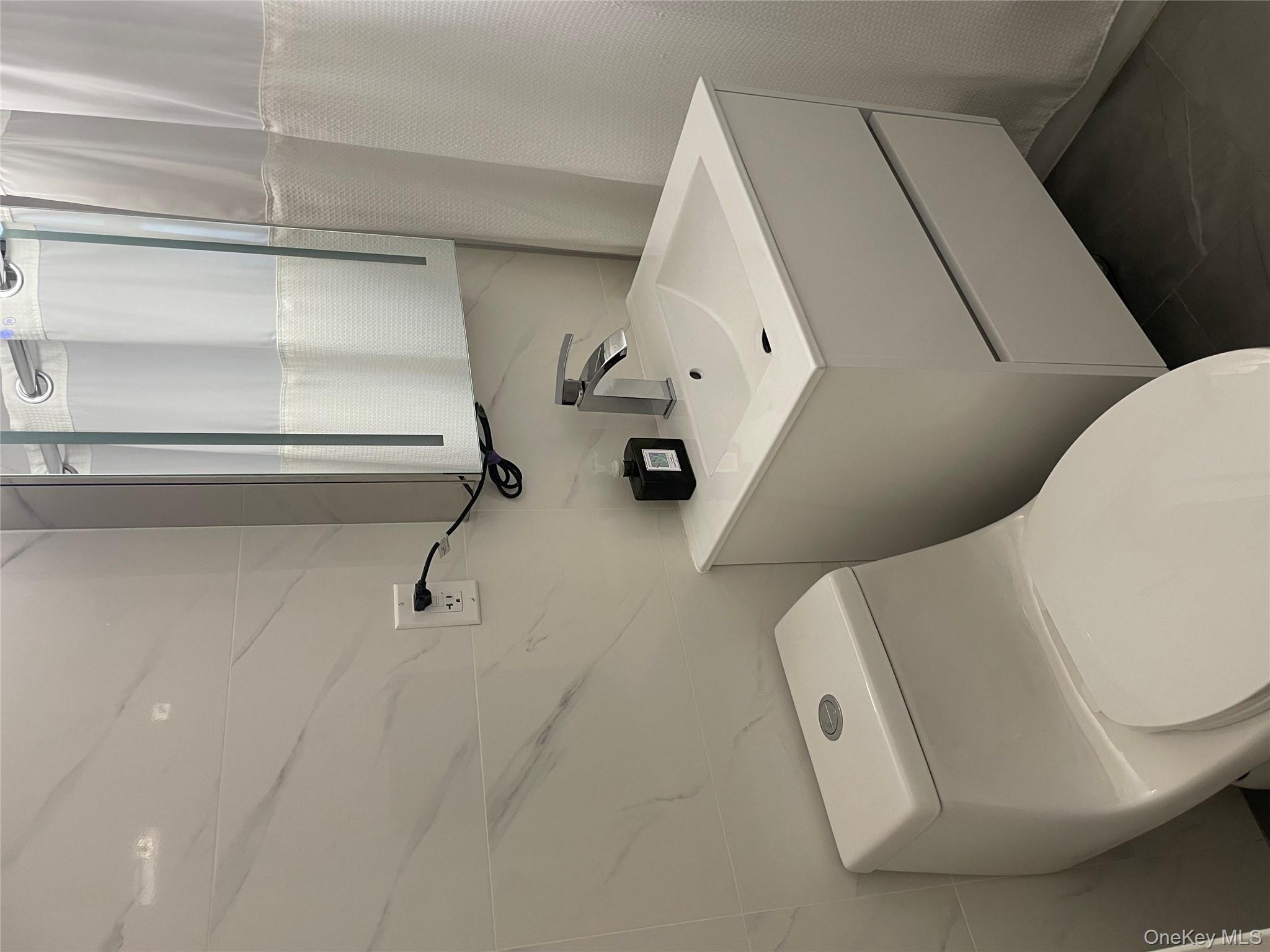 1430 Thieriot Avenue, Unit 6J Bronx, NY 10460 - Photo 8 of 15 Fully upgraded Bathroom with new toilet and new vanity