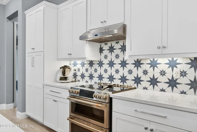 a bedroom with a bed and a cabinets