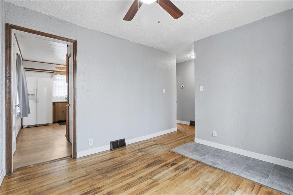 1395 Amity Ridge Road Washington, PA 15301 - Photo 16 of 44 DINING ROOM WITH HARDWOOD FLOORS