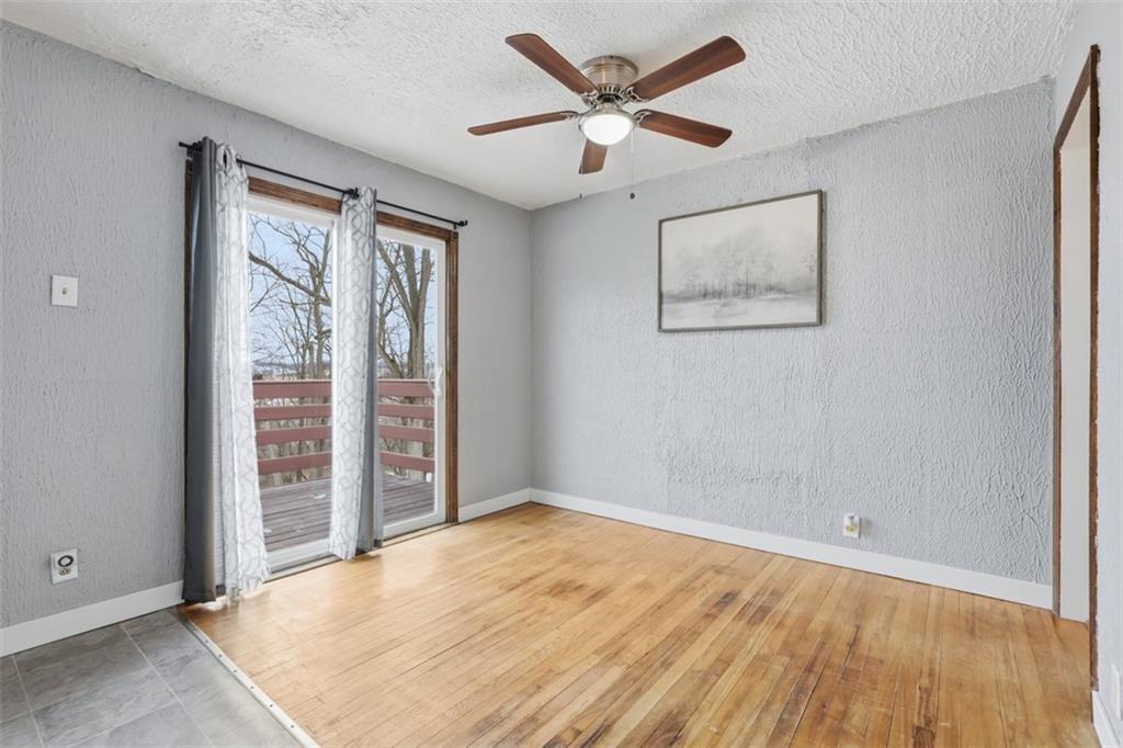 1395 Amity Ridge Road Washington, PA 15301 - Photo 18 of 44 DINING ROOM WITH SLIDING DOOR TO DECK
