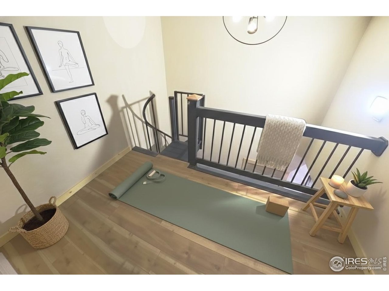 2209 Hatton Place Montrose, CO 81401 - Photo 27 of 41 a view of an empty room with wooden floor