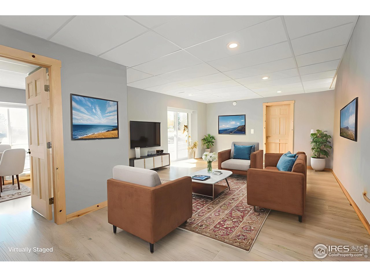 2209 Hatton Place Montrose, CO 81401 - Photo 29 of 41 a living room with furniture and a flat screen tv