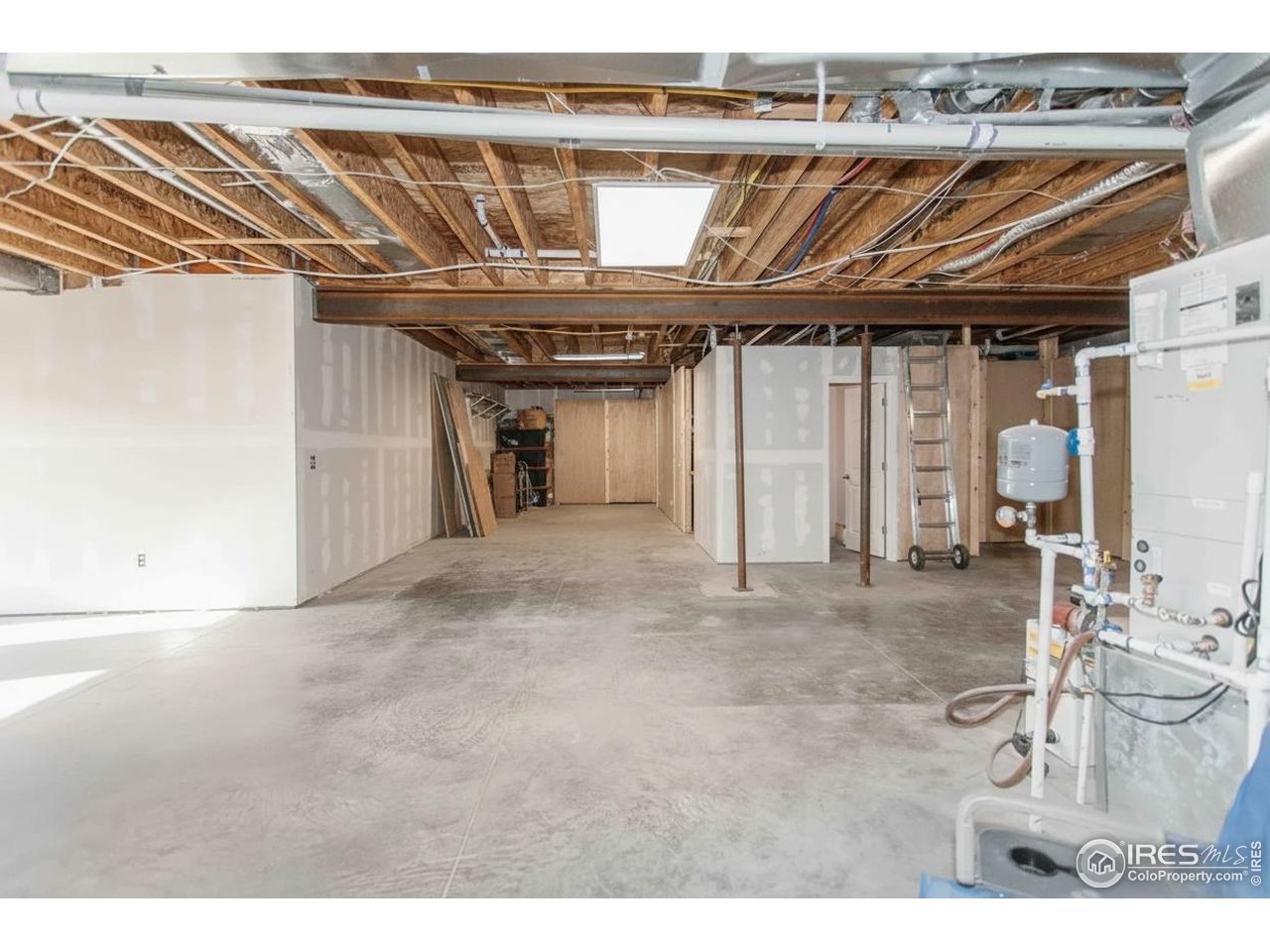 2209 Hatton Place Montrose, CO 81401 - Photo 35 of 41 a view of a room with wooden walls