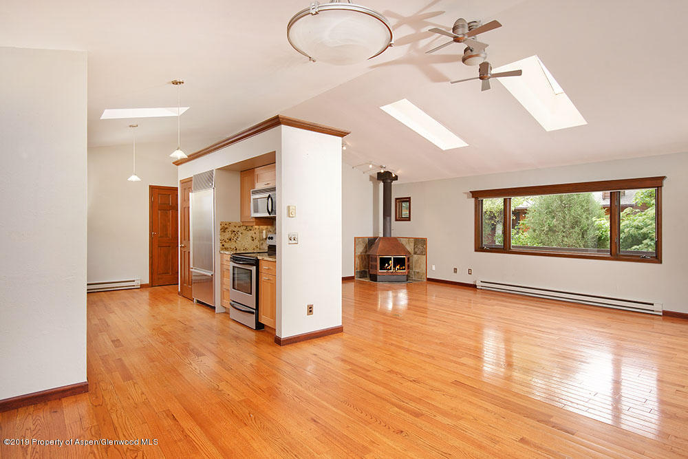 113 Crossland Drive Basalt, CO 81621 - Photo 1 of 23 a view of a livingroom with furniture a ceiling fan and window