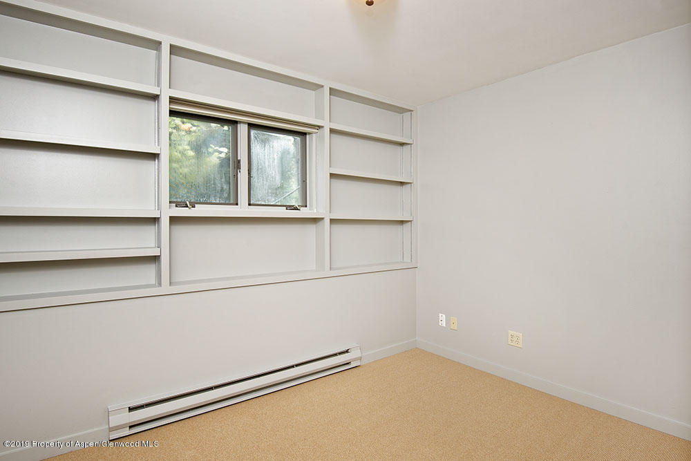 113 Crossland Drive Basalt, CO 81621 - Photo 12 of 23 a view of an empty room with a window