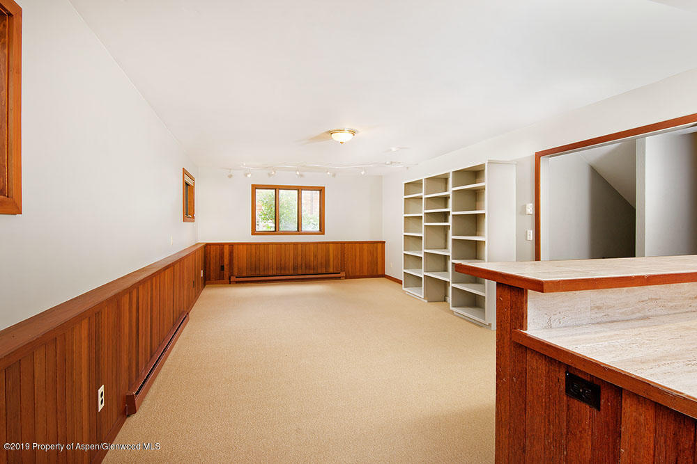 113 Crossland Drive Basalt, CO 81621 - Photo 13 of 23 a view of an empty room with a window