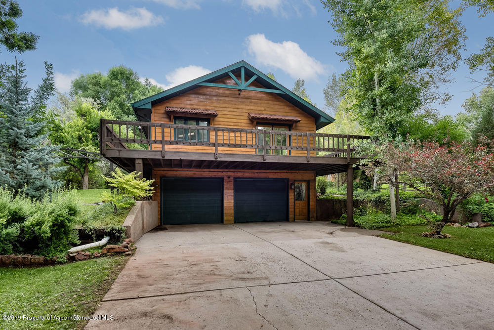 113 Crossland Drive Basalt, CO 81621 - Photo 17 of 23 a house that has a lot of plants in it