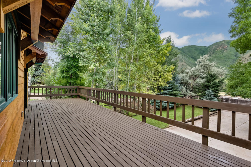 113 Crossland Drive Basalt, CO 81621 - Photo 18 of 23 a view of balcony with wooden floor and fence