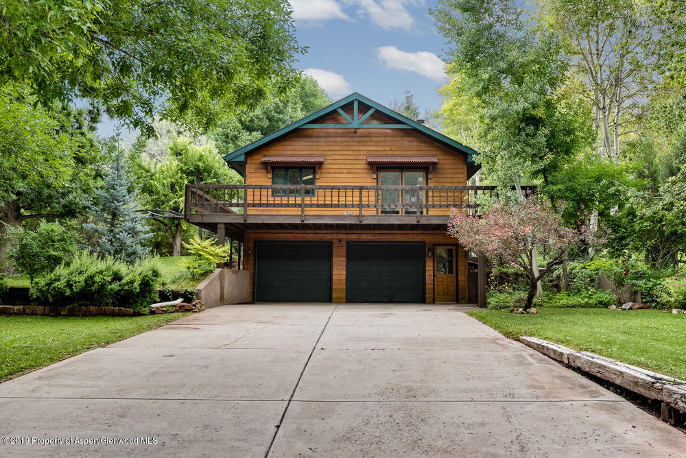 113 Crossland Drive Basalt, CO 81621 - Photo 23 of 23 a front view of house with yard and green space
