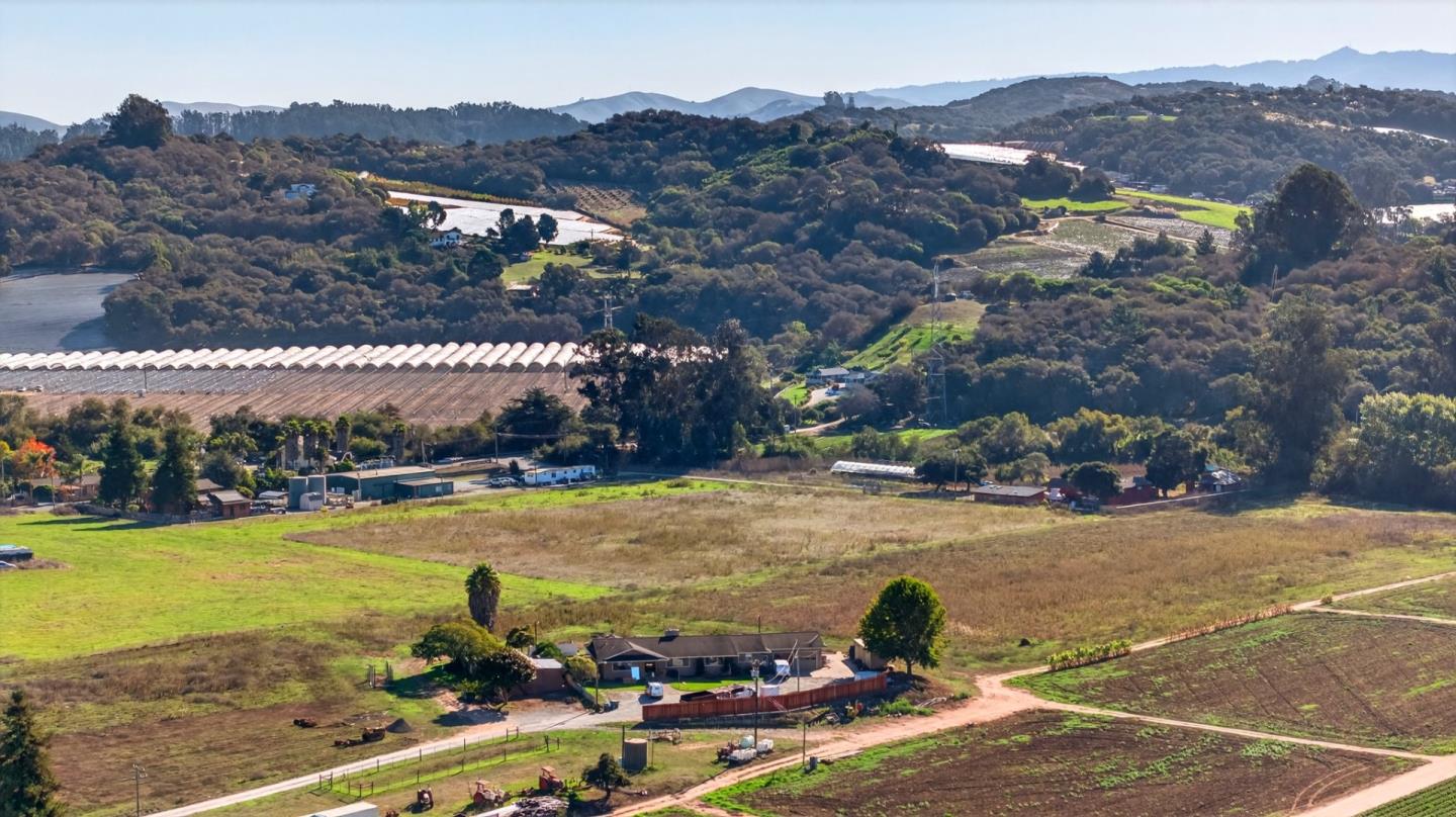 971 San Miguel Canyon Road Watsonville, CA 95076 - Photo 3 of 3 a view of a lake with a mountain in the background