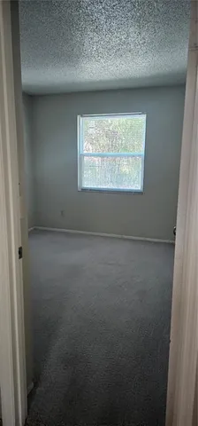 a bathroom with a toilet a sink and shower