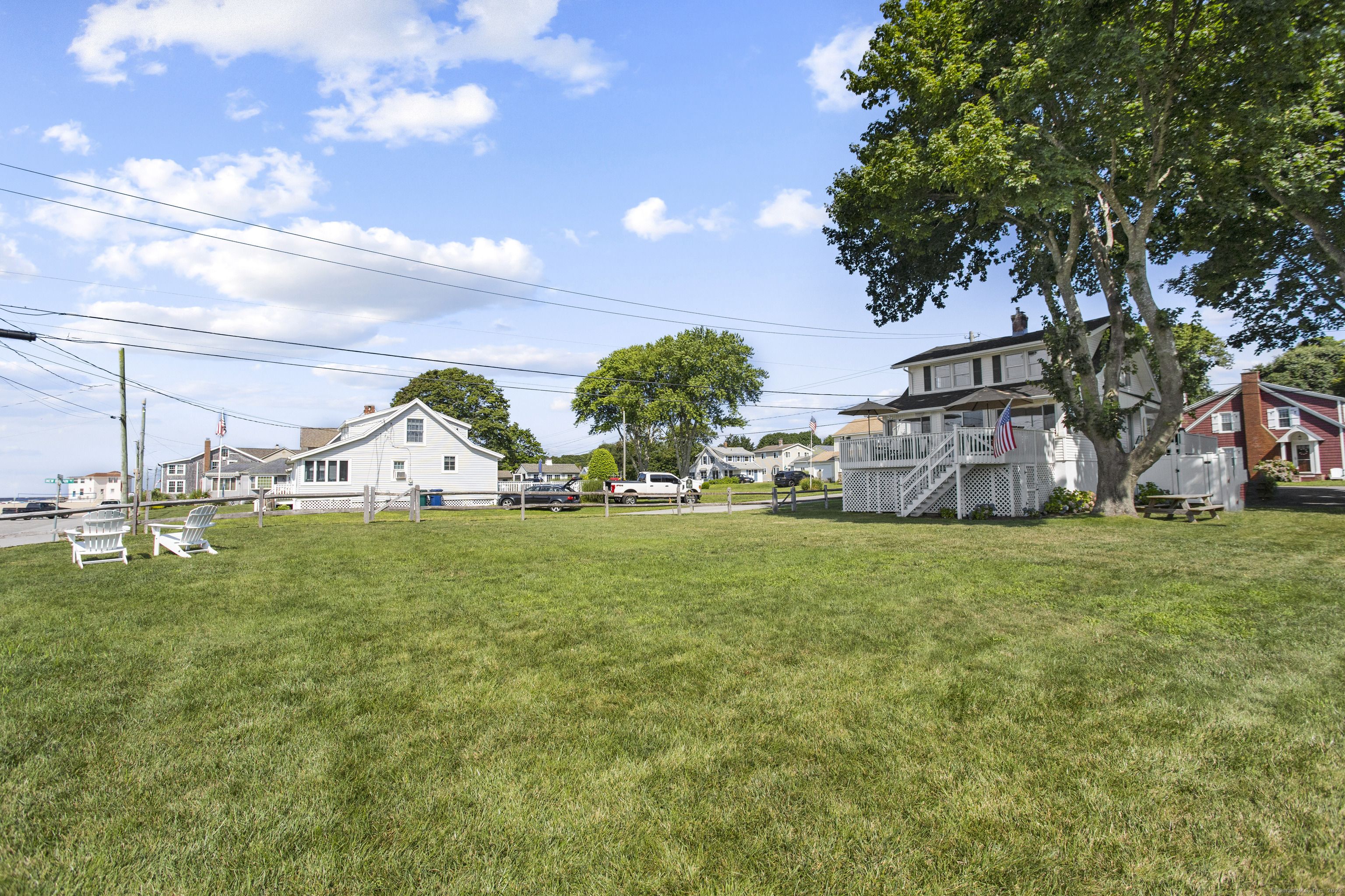 15 Cottage Road Old Lyme, CT 06371 - Photo 26 of 26 a front view of a house with garden