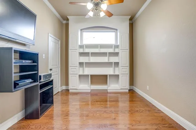 a room with window and a fireplace