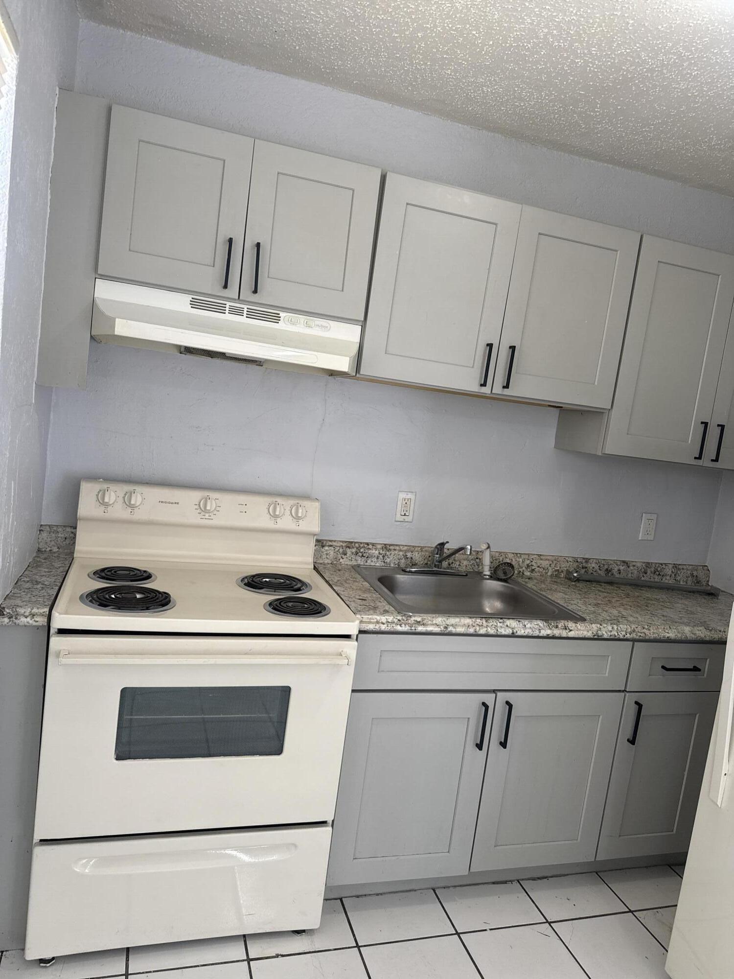 720 Southwest 7th Street, Unit 4 Dania Beach, FL 33004 - Photo 20 of 28 DJI_20260212_133307_960