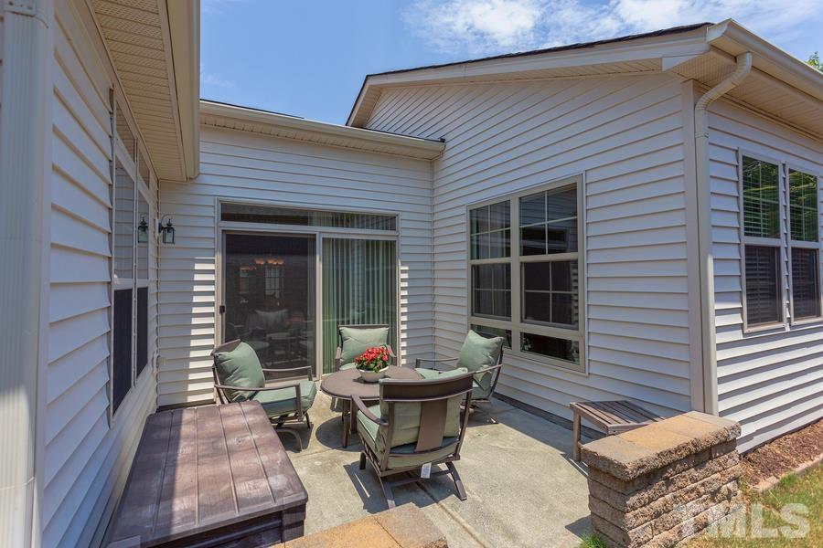 8612 Lasilla Way Raleigh, NC 27616 - Photo 23 of 27 Perfectly placed to add pizzaz to both the side yard and the 3 adjacent rooms inside.
