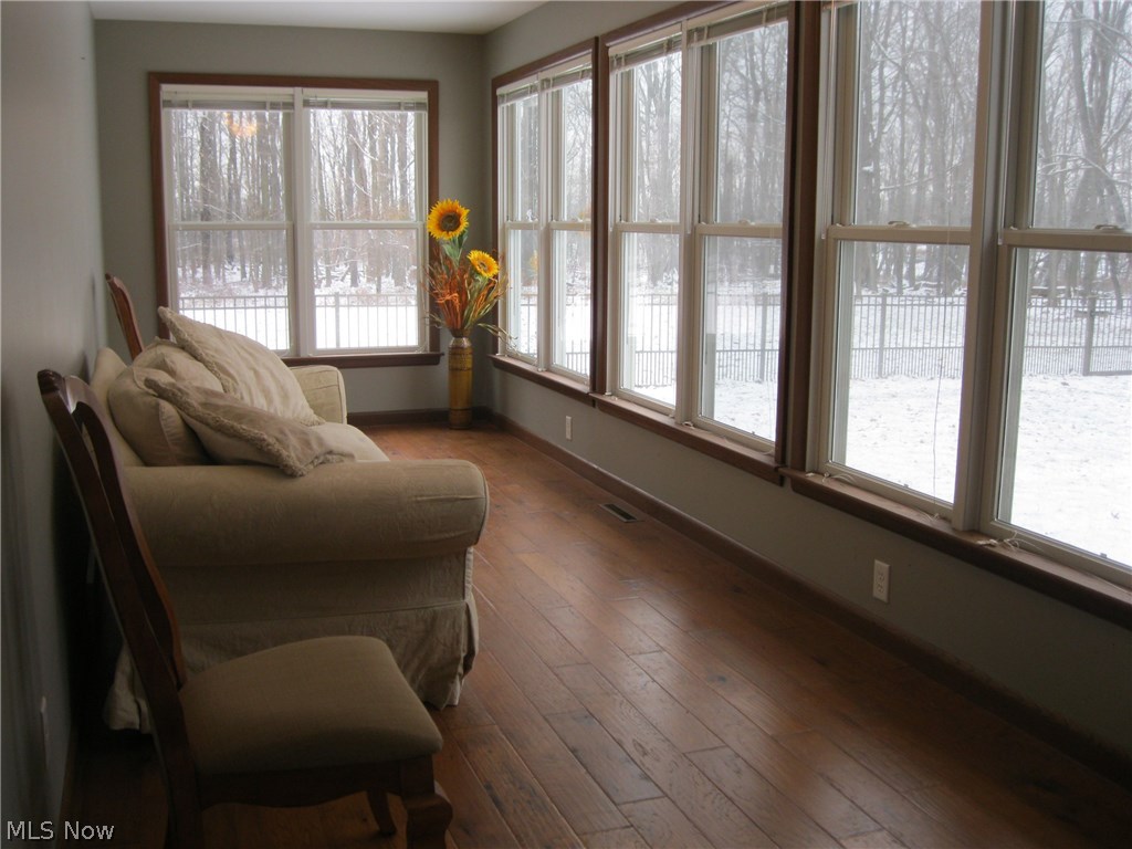 500 Miley Road North Lima, OH 44452 - Photo 5 of 35 28' Sun Room with those gorgeous Hickory Hardwood floors! Different views from all around the house. Just wait until Spring time! which appears to be just around the corner!