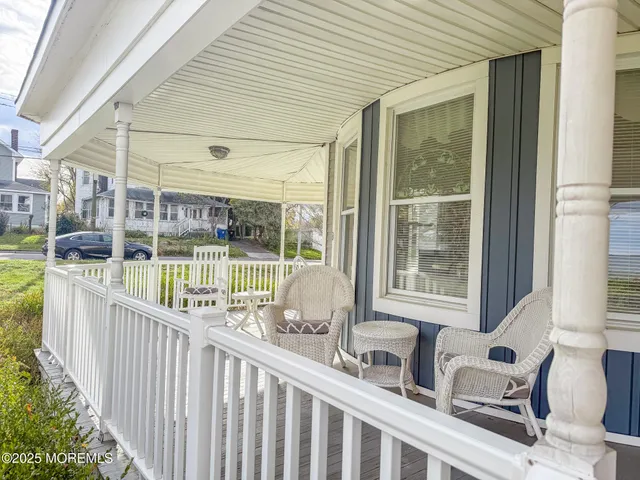 a view of a porch with furniture