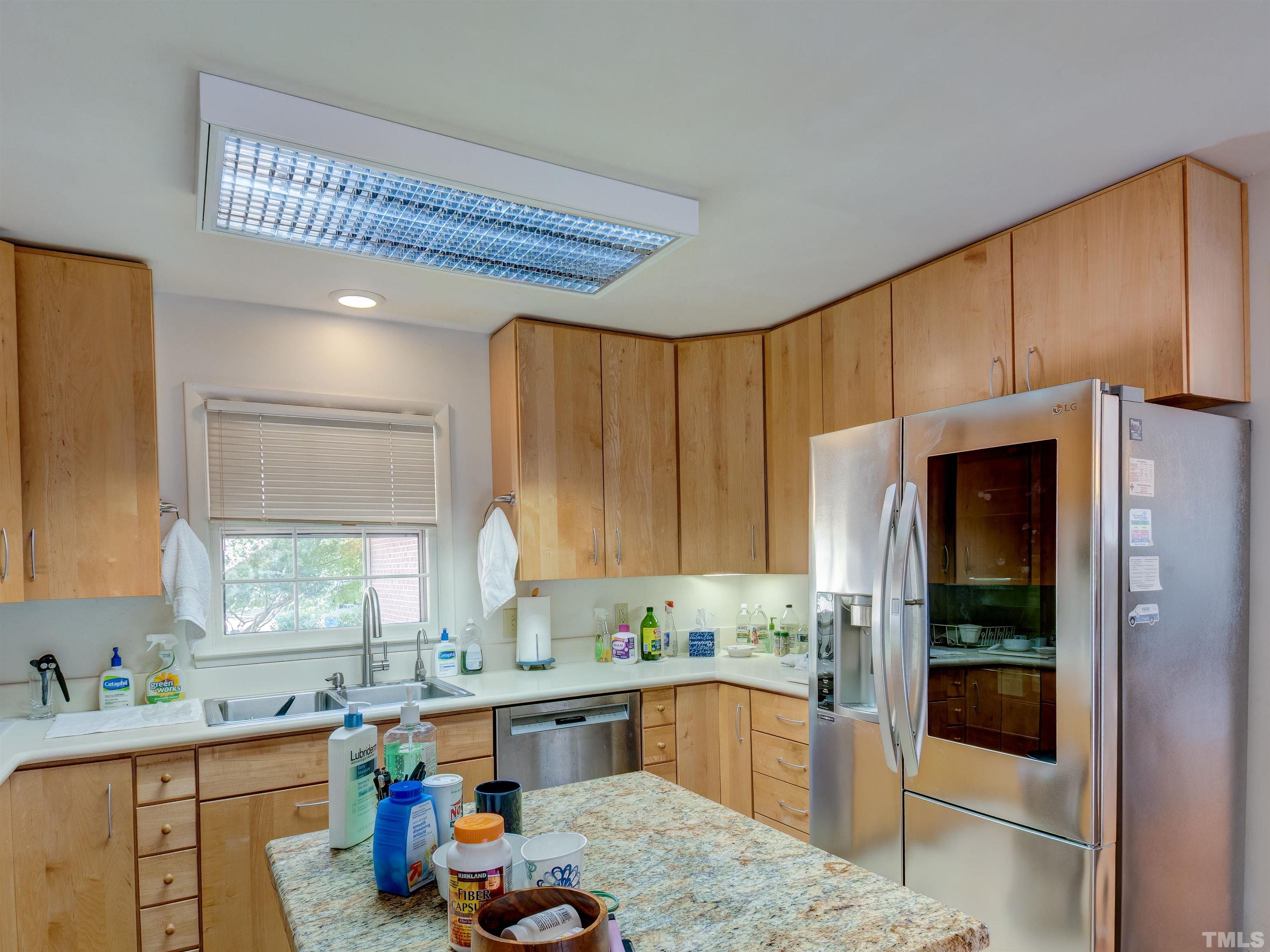 4821 Latimer Road Raleigh, NC 27609 - Photo 13 of 21 a kitchen with a sink and cabinets