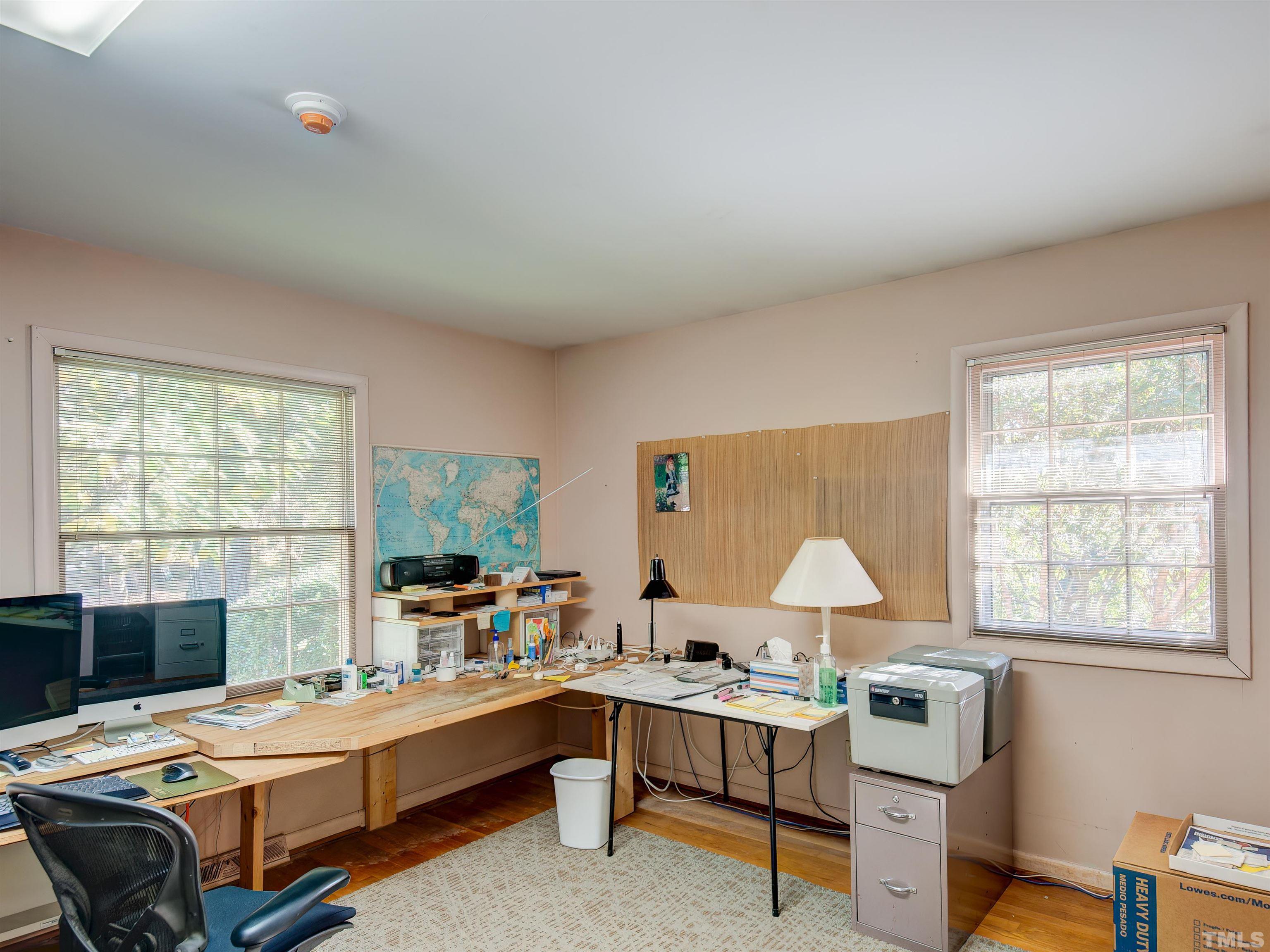 4821 Latimer Road Raleigh, NC 27609 - Photo 18 of 21 a room with furniture and a window