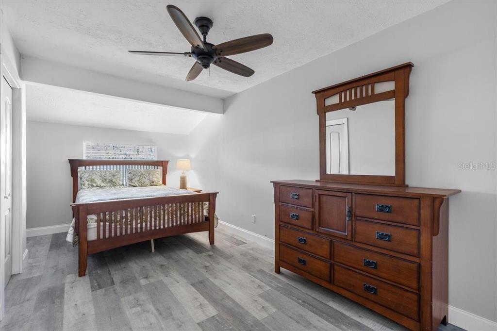 7226 Alafia Ridge Loop Riverview, FL 33569 - Photo 23 of 51 a view of a bedroom with furniture and a window