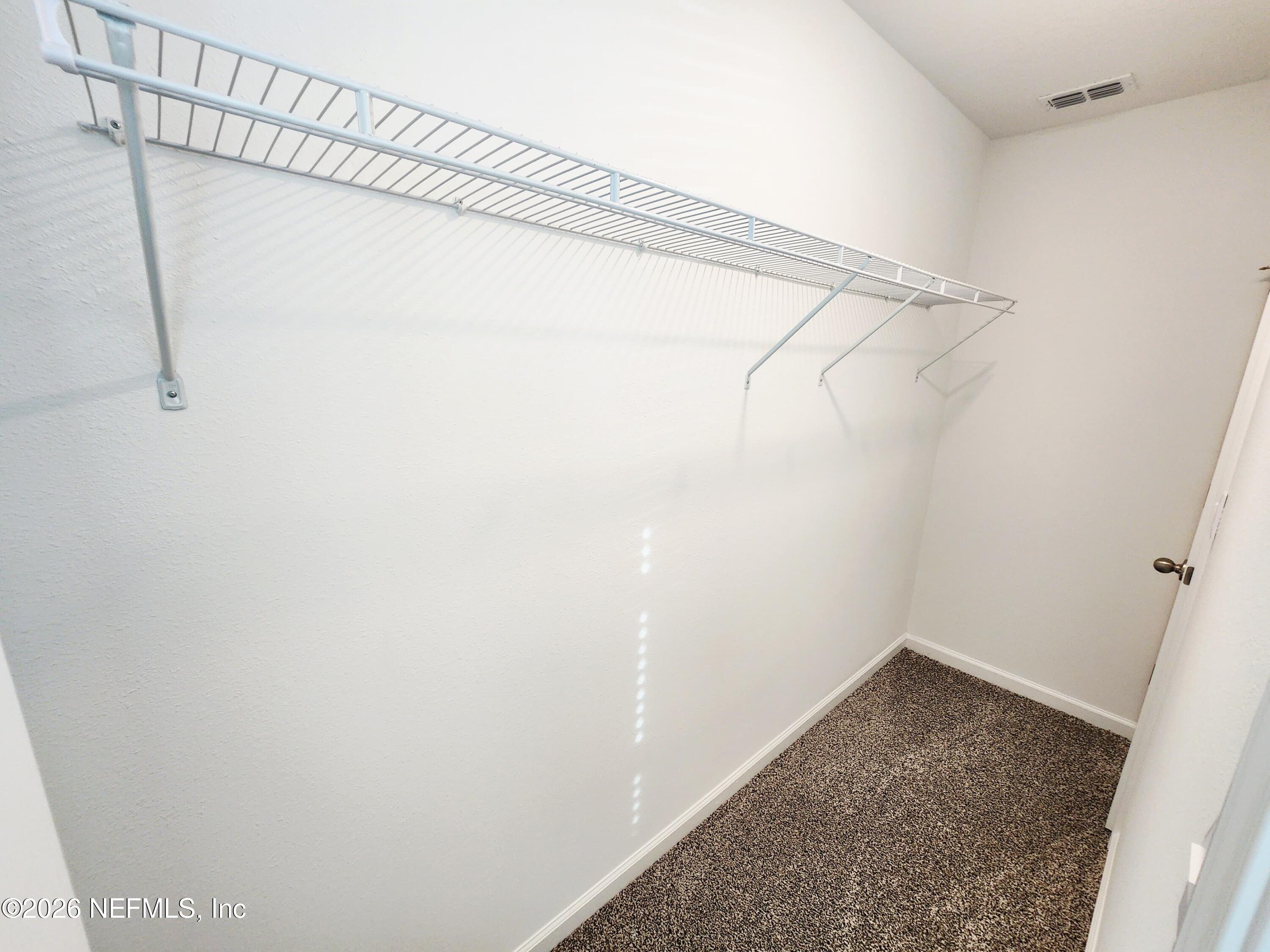 51 Palmetto Rdg Road St. Augustine, FL 32095 - Photo 16 of 16 a view of a room with racks on the wall