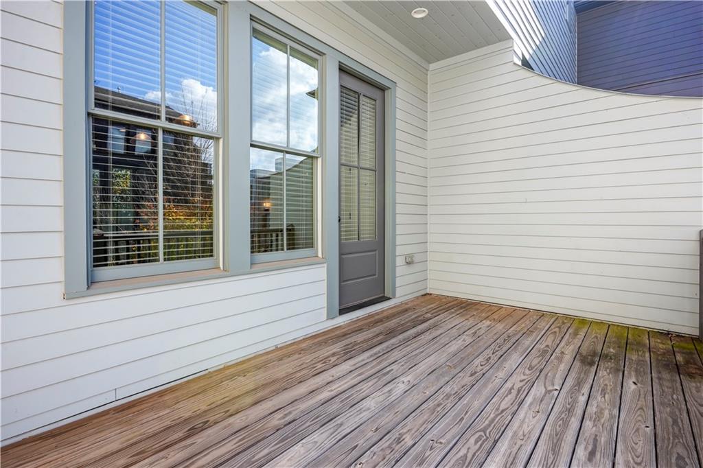 689 Fraser Street Southeast Atlanta, GA 30315 - Photo 12 of 32 a view of house with deck and wooden floor