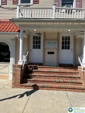 a front view of a house with entryway