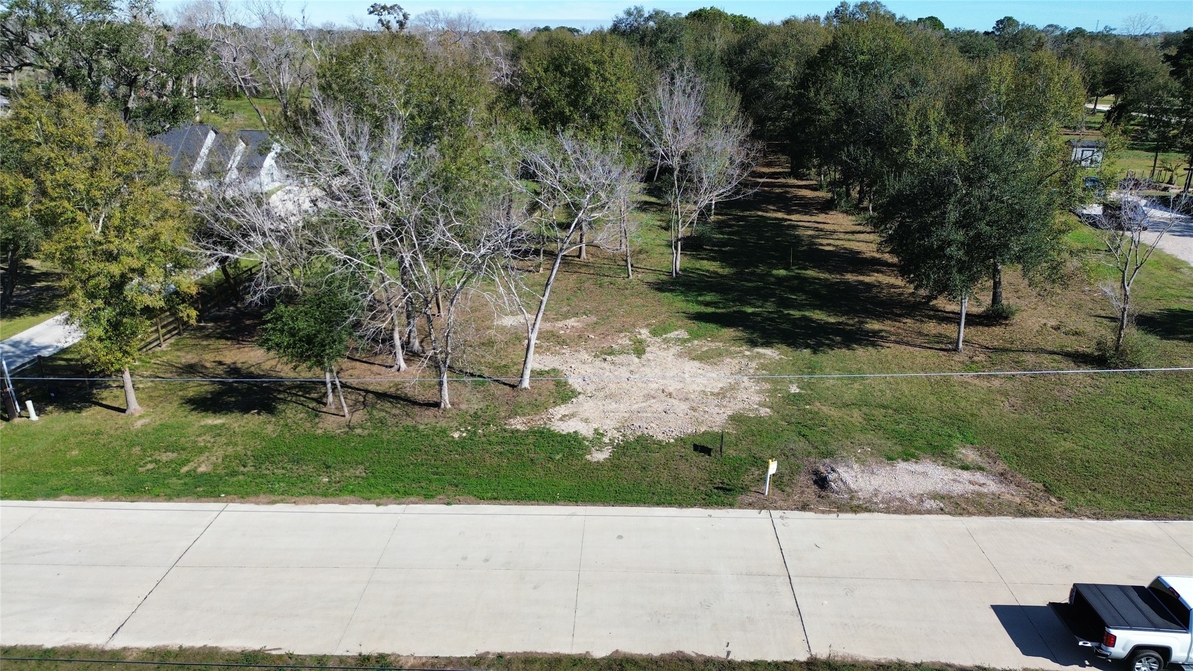 4607 Shadow Pond Lane Alvin, TX 77511 - Photo 2 of 12 a view of a park with some trees