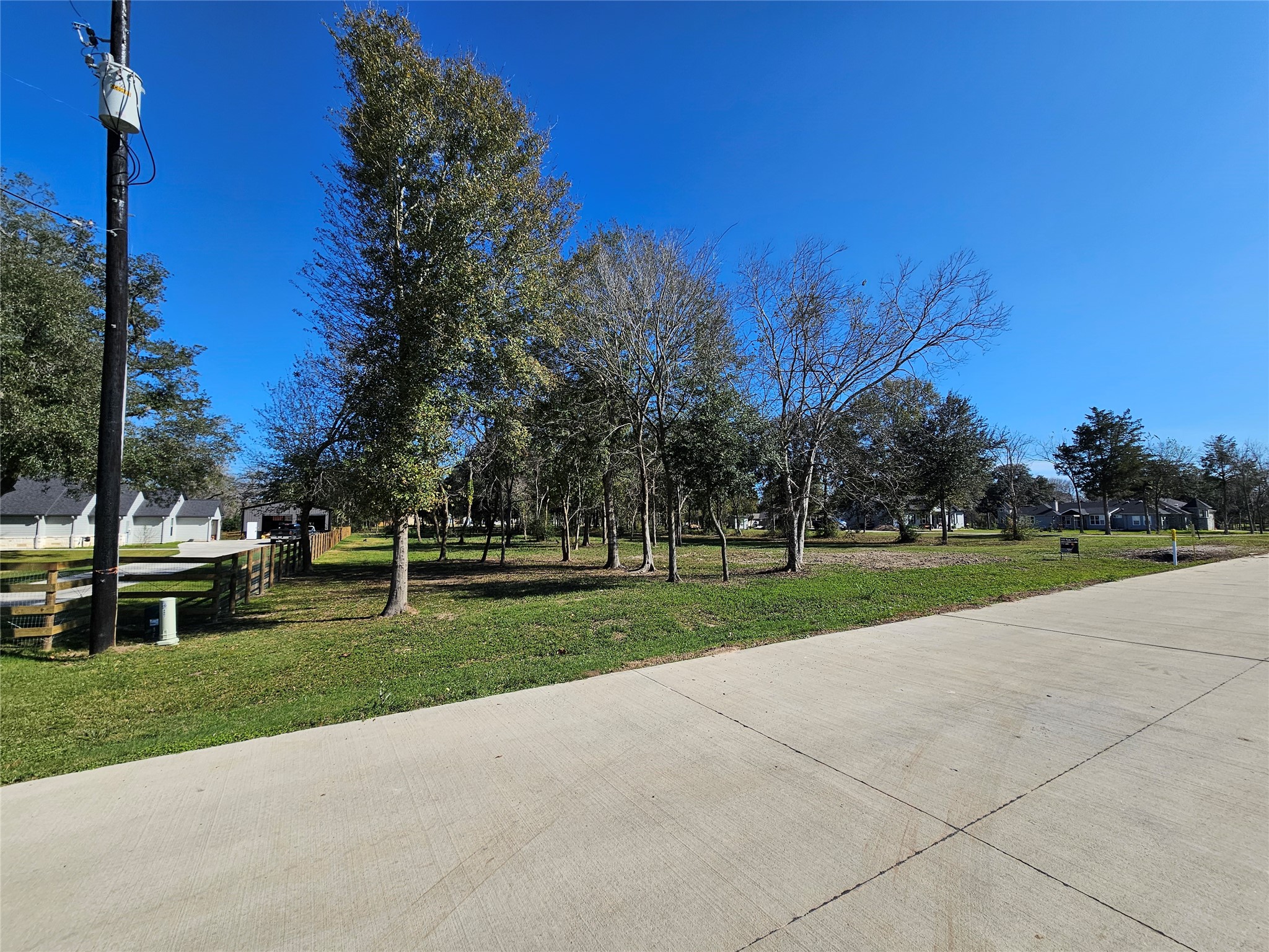 4607 Shadow Pond Lane Alvin, TX 77511 - Photo 8 of 12 a view of a park with large trees