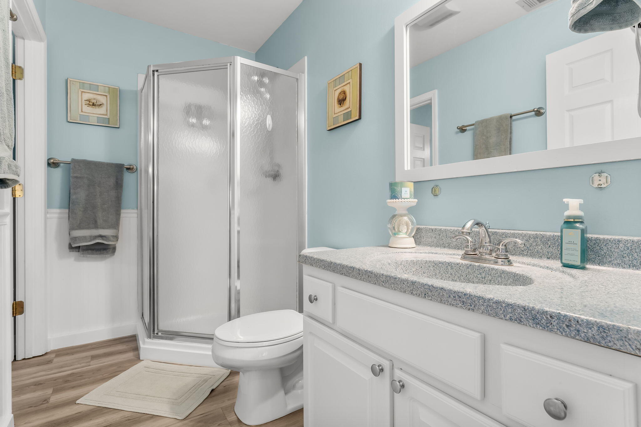 193 Portland Park Road Freeport, FL 32439 - Photo 18 of 62 a bathroom with a granite countertop sink toilet and shower