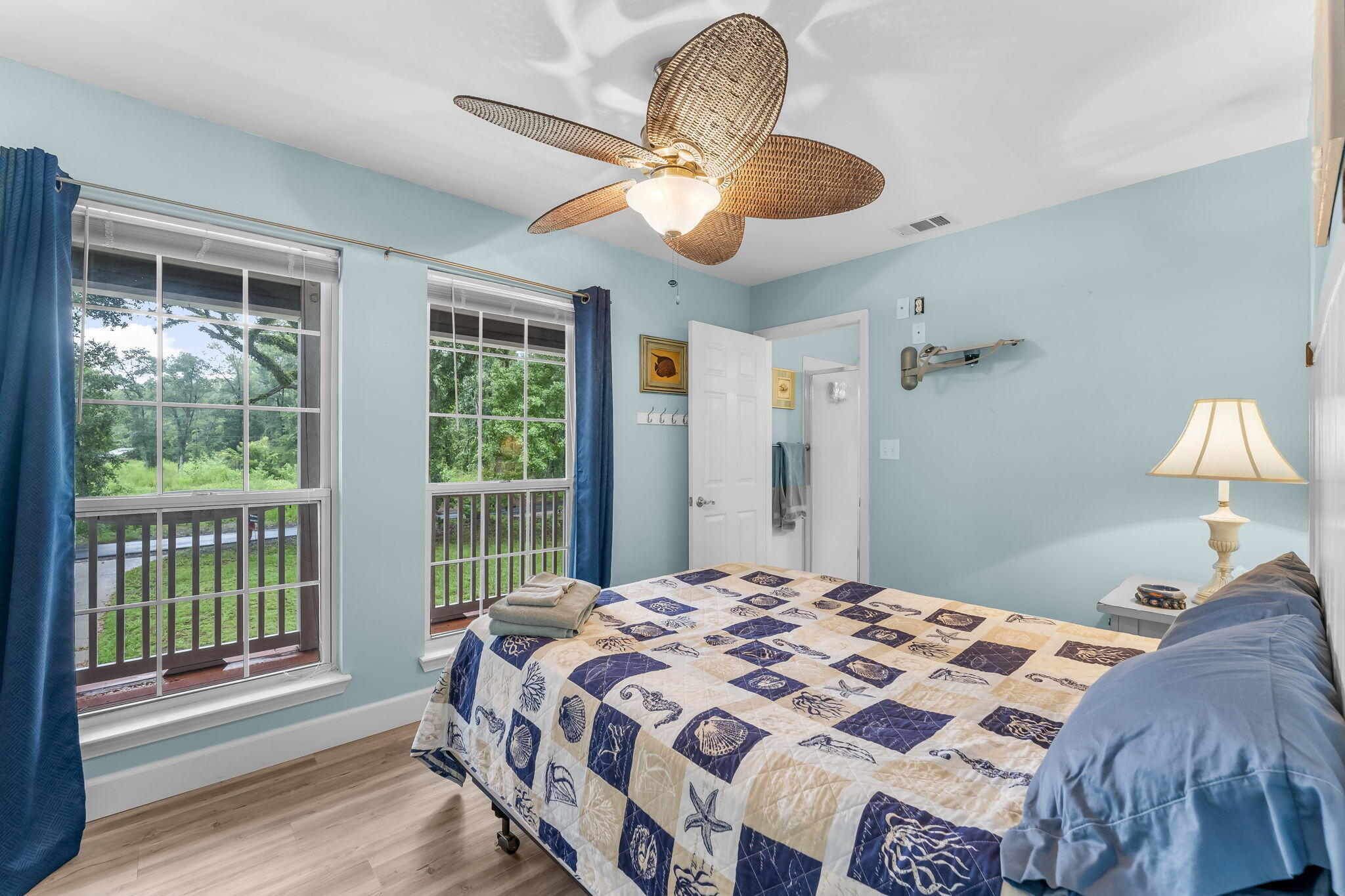 193 Portland Park Road Freeport, FL 32439 - Photo 20 of 62 a bedroom with a bed and a large window