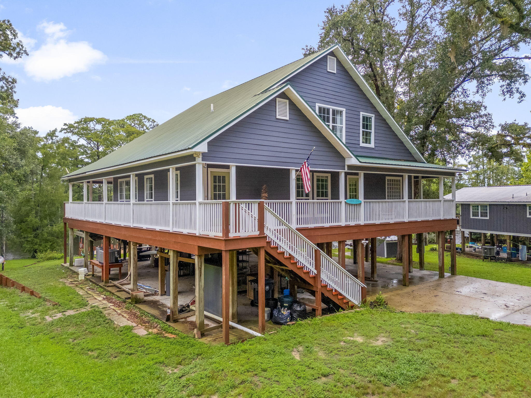 193 Portland Park Road Freeport, FL 32439 - Photo 2 of 62 a view of a house with a yard and sitting area