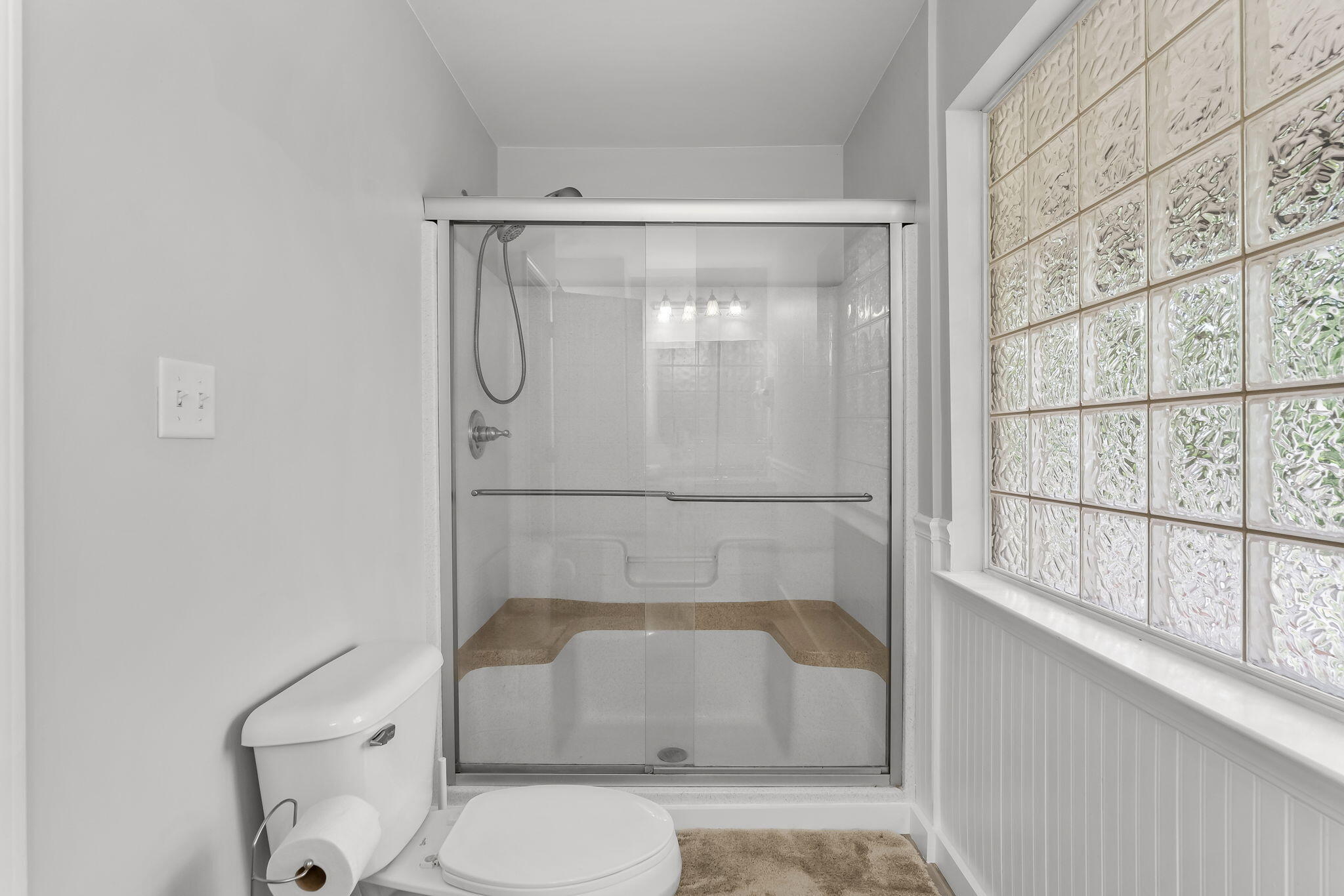 193 Portland Park Road Freeport, FL 32439 - Photo 22 of 62 a bathroom with a white toilet and a shower