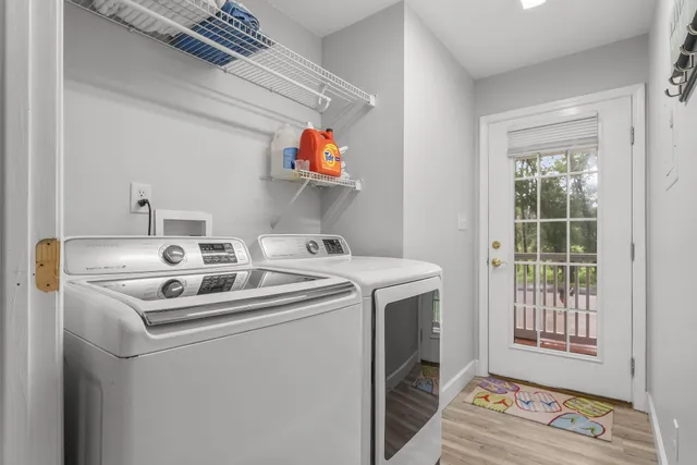 a bathroom with a white toilet and a shower