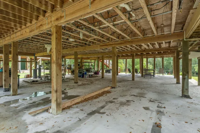 a view of a room with wooden roof