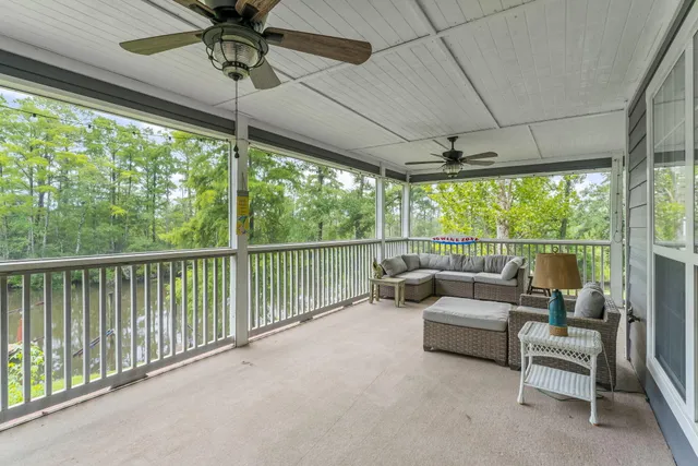a view of a garden with a house in the background
