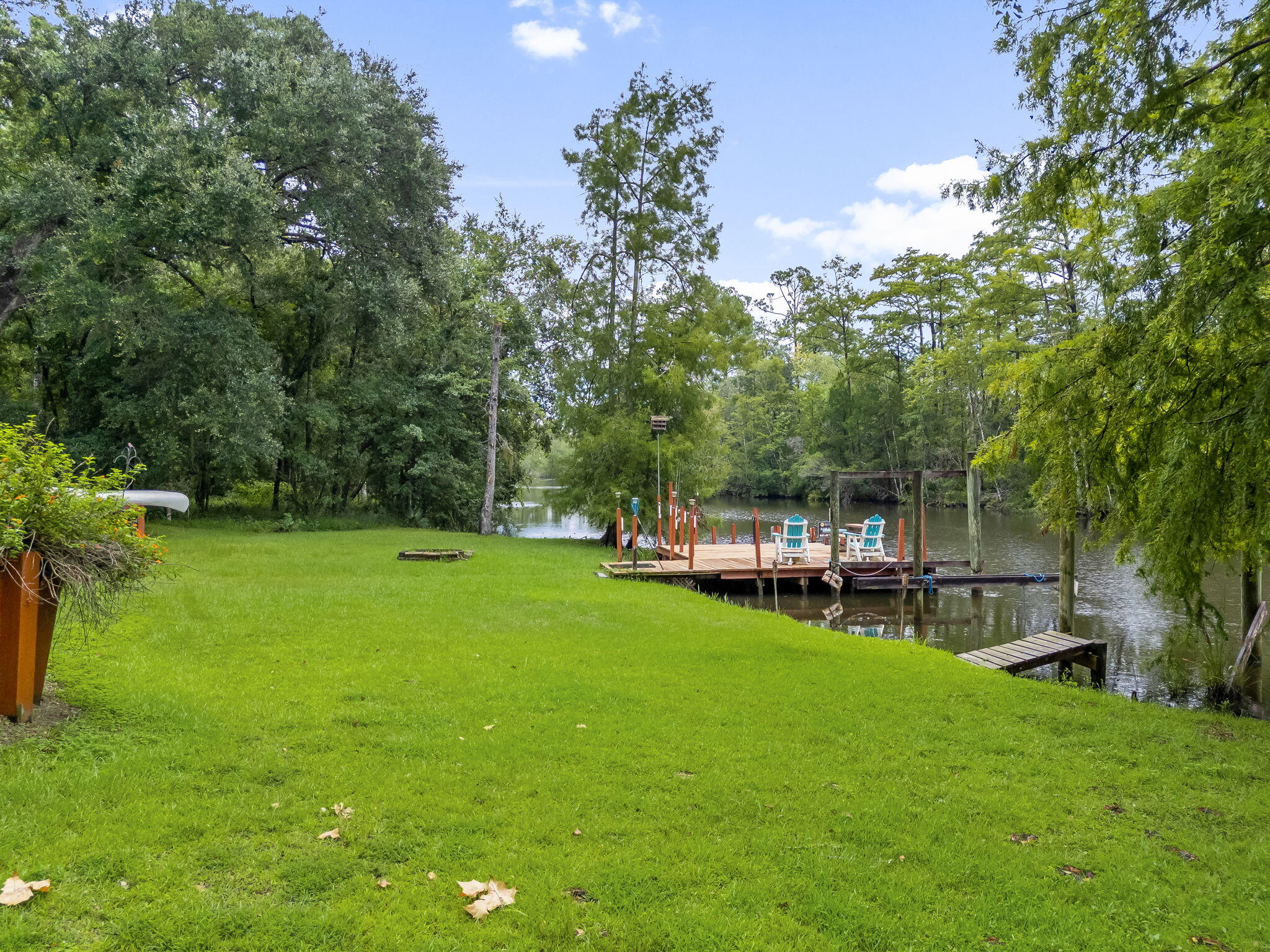 193 Portland Park Road Freeport, FL 32439 - Photo 52 of 62 a view of a house with a backyard