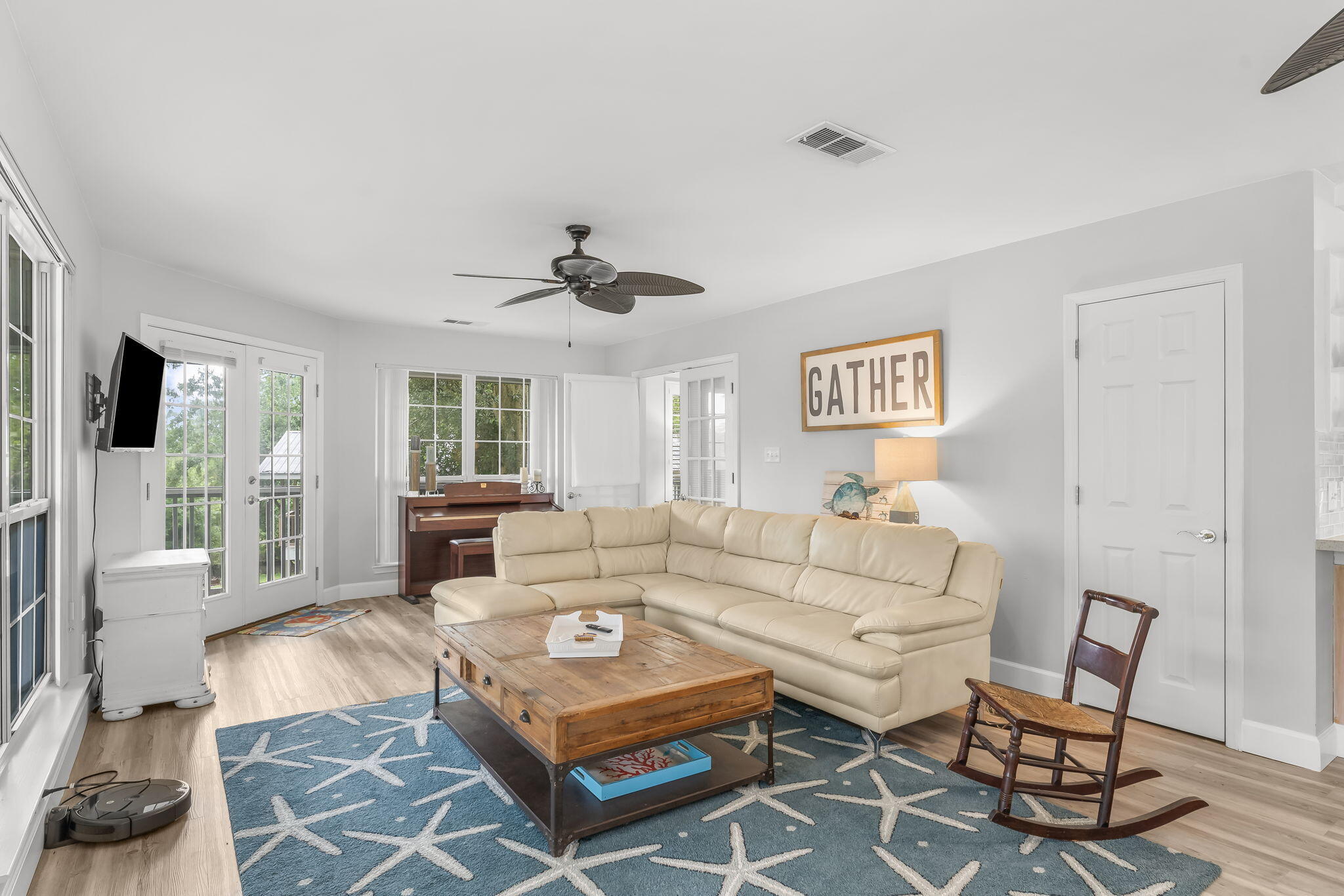 193 Portland Park Road Freeport, FL 32439 - Photo 8 of 62 a living room with furniture a table and a large window