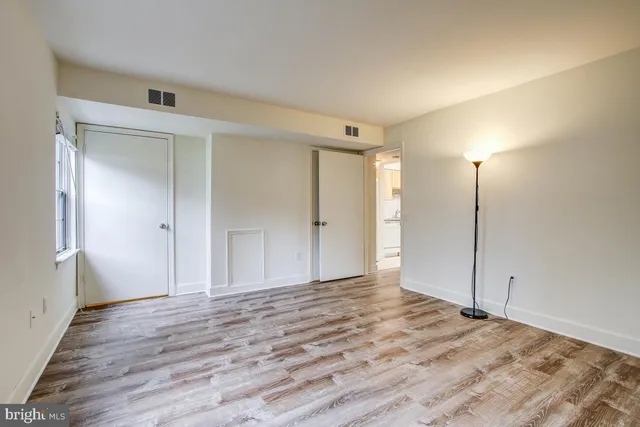 a close view of a utility room with dryer and washer