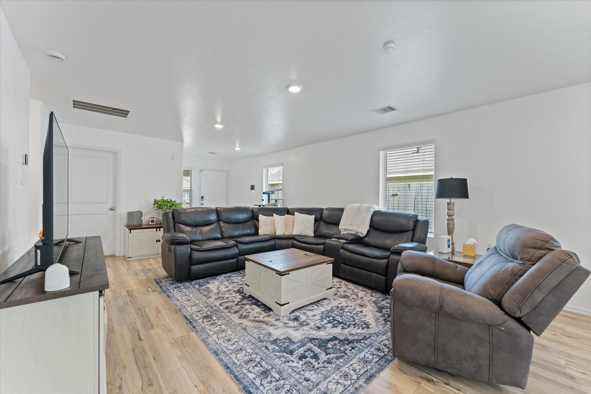 248 Rustic Ridge Circle Magnolia, TX 77354 - Photo 25 of 27 Open floor plan with vinyl wood flooring throughout