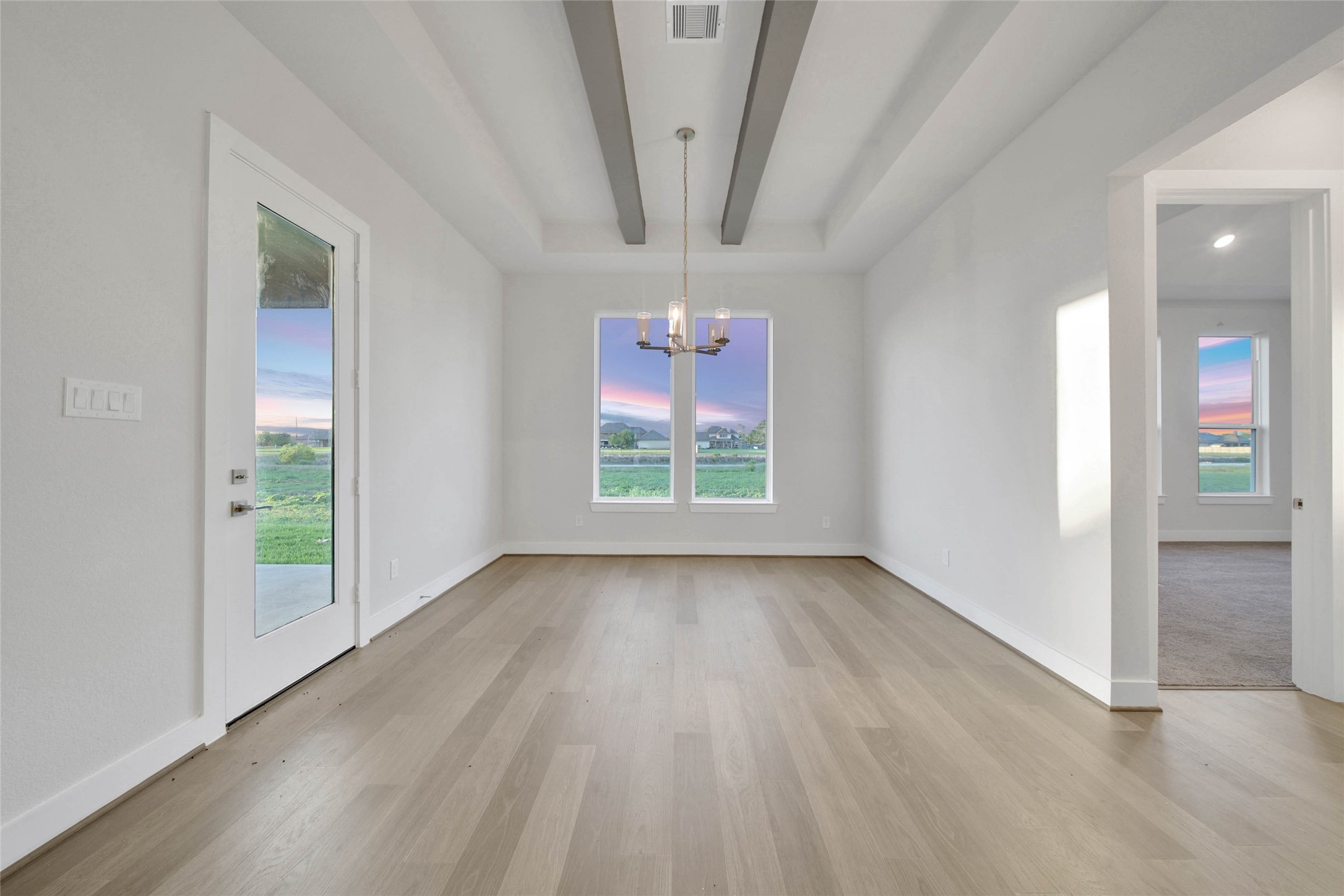 4515 Magnolia Bend Drive Rosharon, TX 77583 - Photo 15 of 46 wooden floor in an empty room with a window