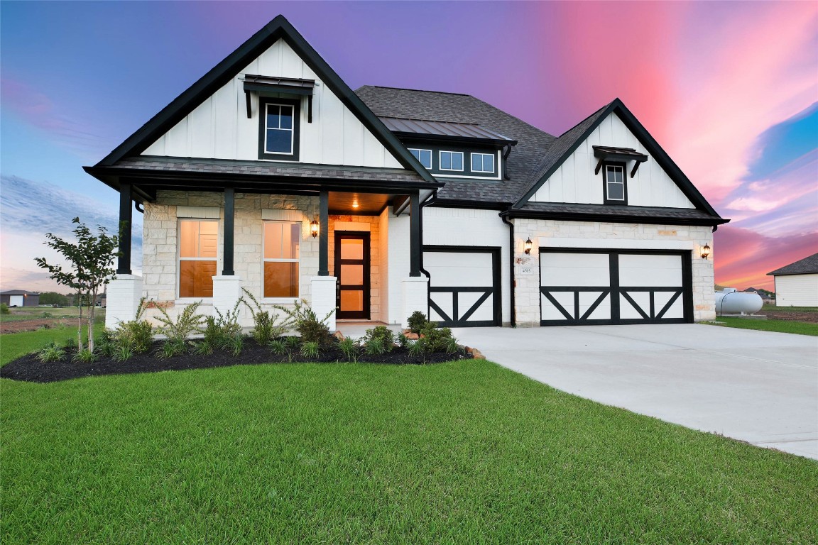 4515 Magnolia Bend Drive Rosharon, TX 77583 - Photo 2 of 46 a front view of a house with garden